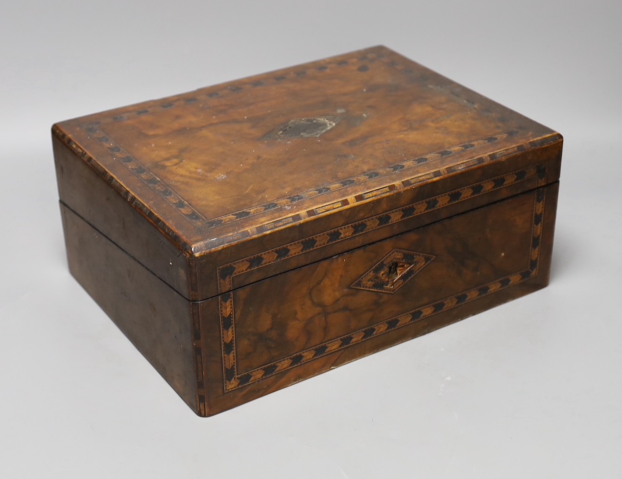 Two 19th century inlaid walnut boxes and a painted mahogany box, The largest 30 cm wide